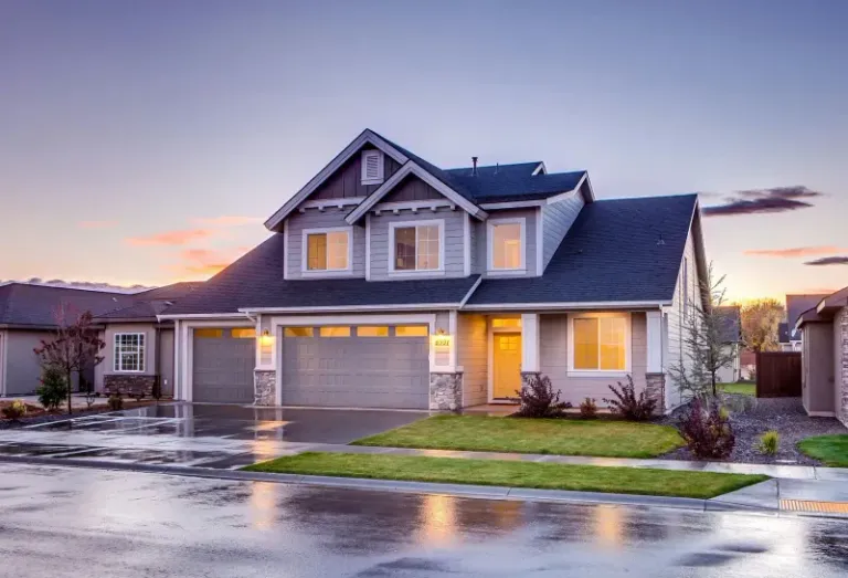 Residential home exterior with multiple finished windows