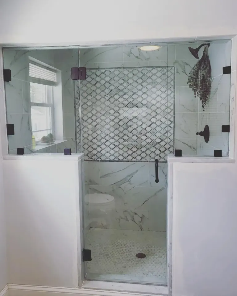Custom shower glass and tiled half wall