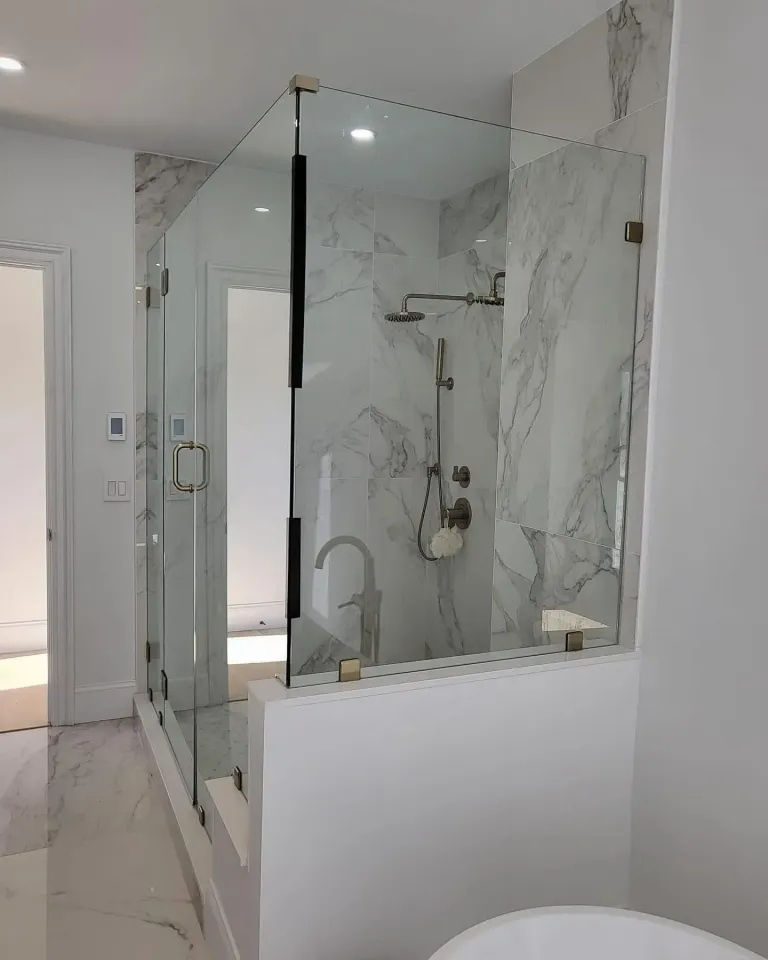 Semi-frameless shower door with visible support hardware