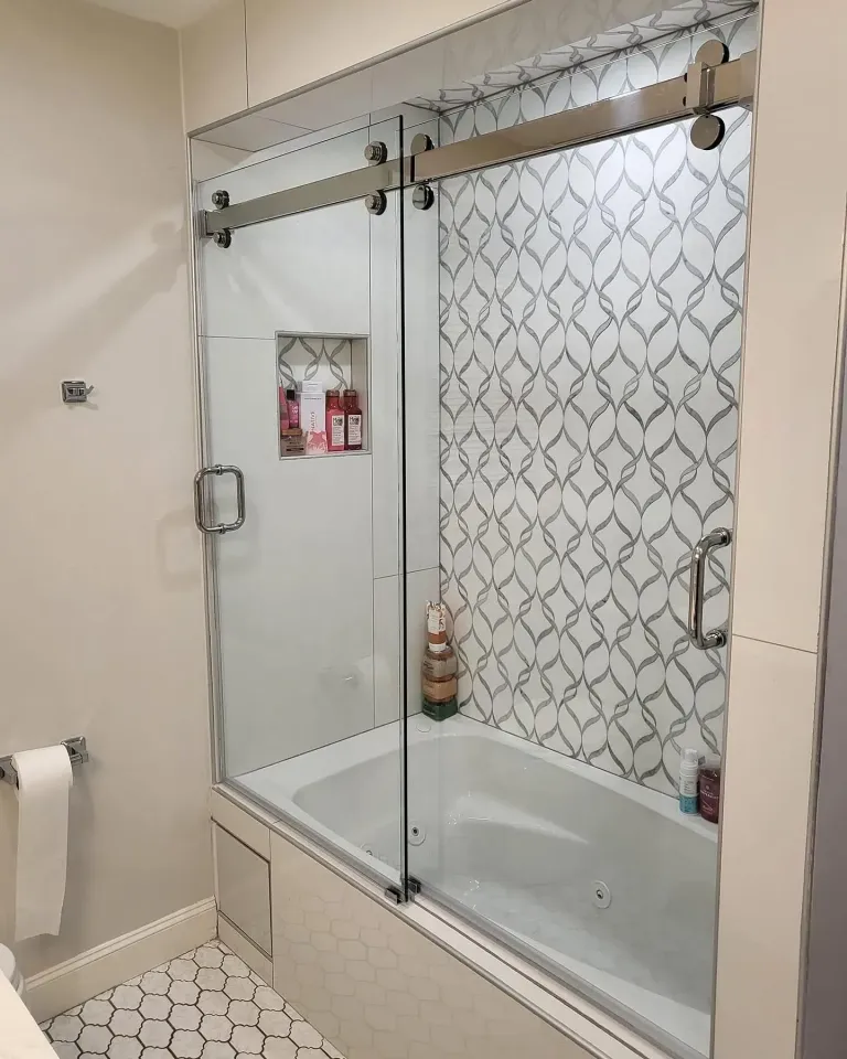 Sliding shower door with chrome hardware